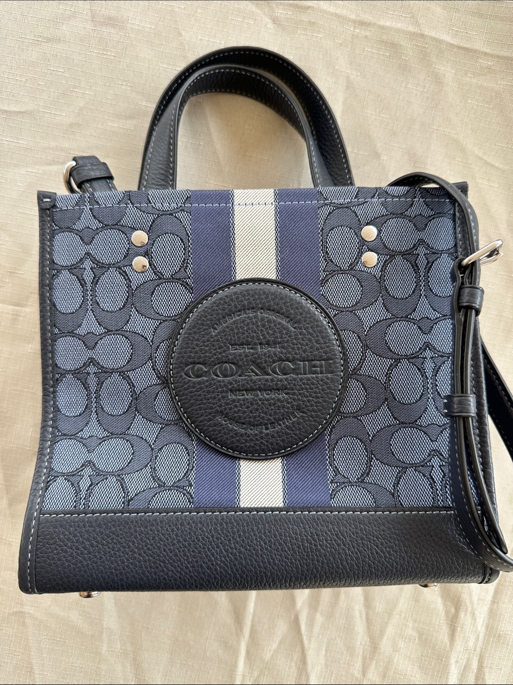 Coach Dempsey logo in navy with crossbody
